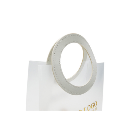 Shopper trasparente con manico similpelle
